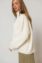 Kanna Mock Neck Zip-Up Jacket in Cream, studio view