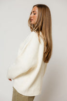 Kanna Mock Neck Zip-Up Jacket in Cream, styled view